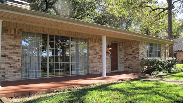 property entrance featuring a porch