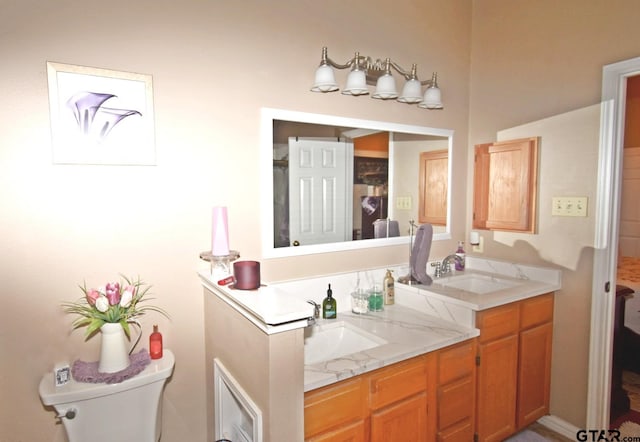 2333 Baretta Dr, Mesquite, TX 75181 - bathroom with toilet and double vanity