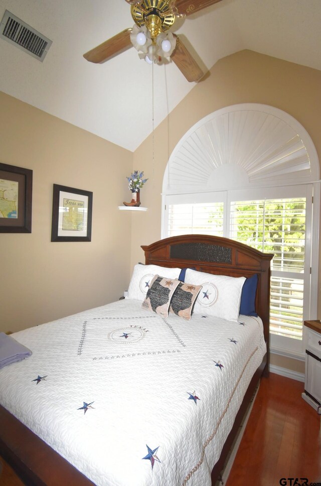 2333 Baretta Dr, Mesquite, TX 75181 - bedroom featuring vaulted ceiling, wood finished floors, and ceiling fan