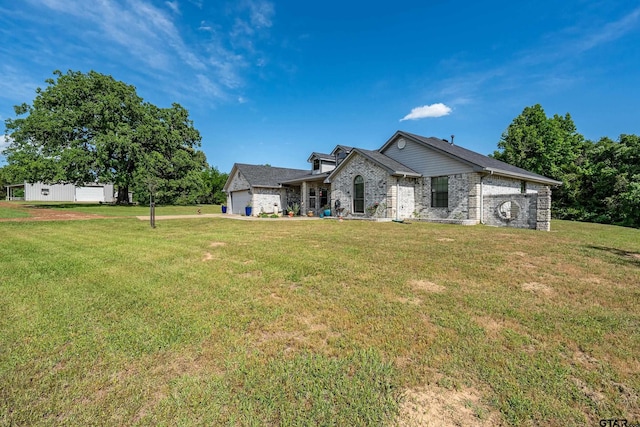 8533 Fm 315, Frankston, TX 75763 - view of front of home featuring an attached garage, a front yard, and brick siding