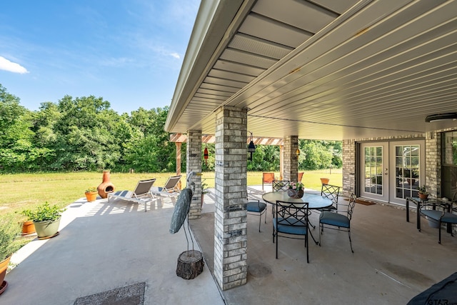 8533 Fm 315, Frankston, TX 75763 - view of patio / terrace featuring french doors and outdoor dining area