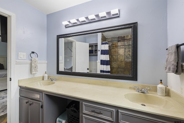 14553 Stone Creek Dr, Tyler, TX 75709 - full bathroom with double vanity, a sink, and curtained shower