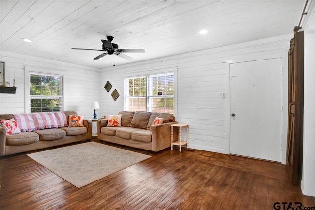 13926 State Highway 64e, Tyler, TX 75707 - living area featuring hardwood / wood-style flooring, a ceiling fan, wood ceiling, wooden walls, and recessed lighting