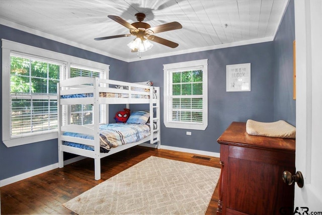 13926 State Highway 64e, Tyler, TX 75707 - bedroom with wood finished floors, ceiling fan, and crown molding
