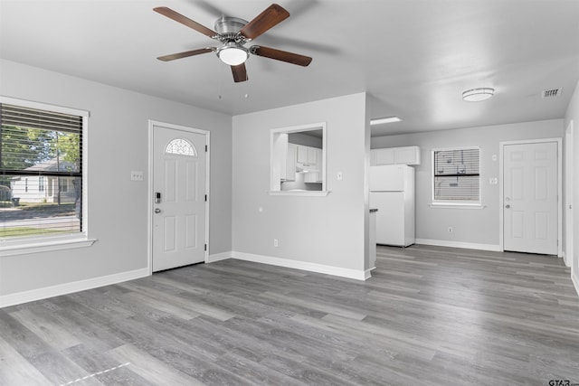 104 E Cedar St, Tyler, TX 75702 - foyer featuring a ceiling fan, baseboards, and wood finished floors
