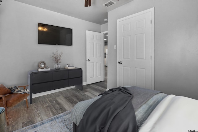 104 E Cedar St, Tyler, TX 75702 - bedroom featuring wood finished floors, ceiling fan, and baseboards