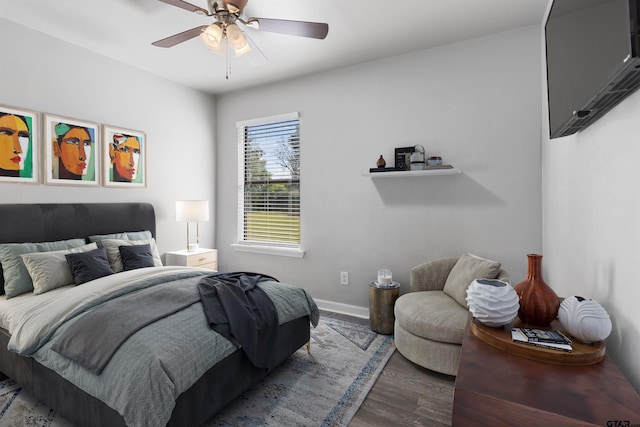 104 E Cedar St, Tyler, TX 75702 - bedroom with baseboards, wood finished floors, and ceiling fan