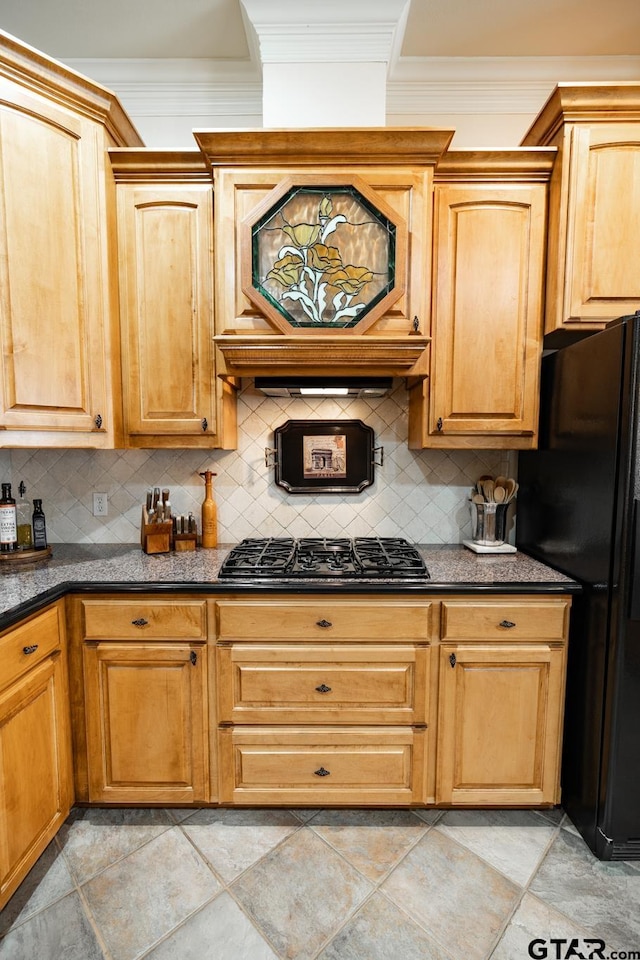 kitchen with ornamental molding, decorative backsplash, and black appliances