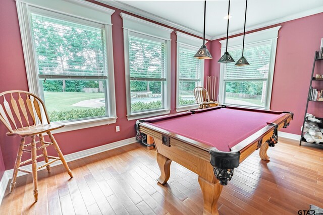 rec room with billiards, light wood-type flooring, and crown molding