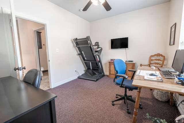 office featuring light carpet and ceiling fan