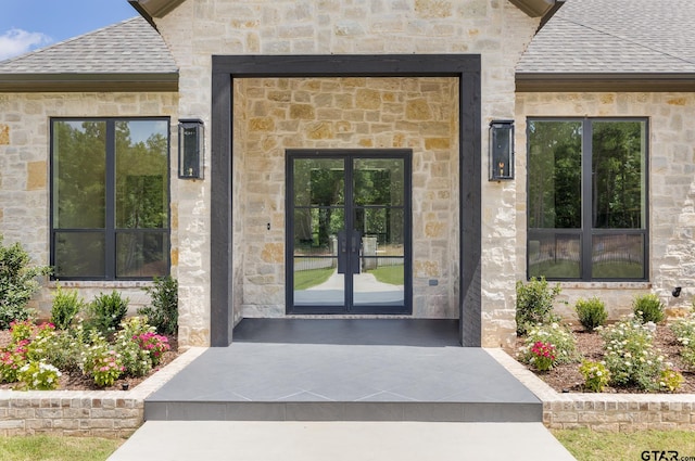 entrance to property featuring french doors