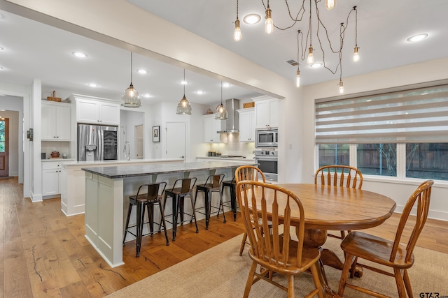 763 Hampton Hill Hill, Tyler, TX 75703 - dining area with light wood-style flooring and recessed lighting
