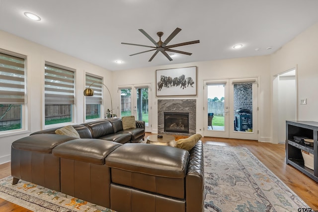763 Hampton Hill Hill, Tyler, TX 75703 - living room featuring ceiling fan, wood finished floors, and a high end fireplace