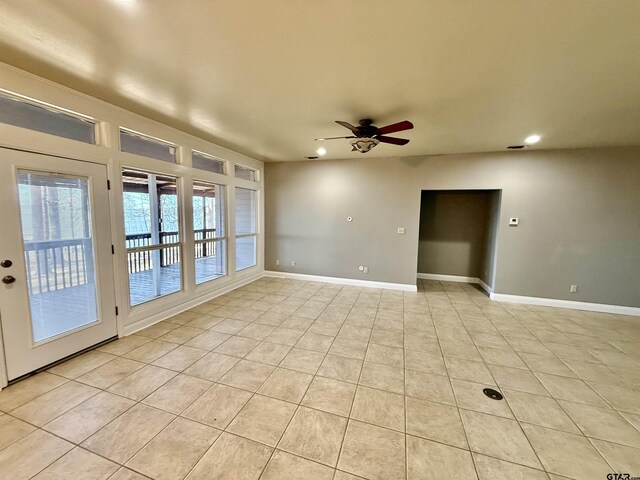 empty room featuring recessed lighting, baseboards, ceiling fan, and light tile patterned flooring