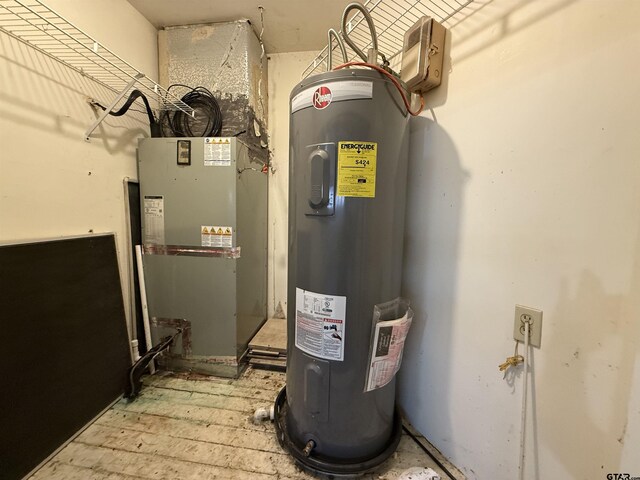 utility room with electric water heater