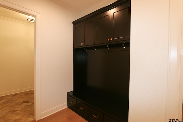 16511 Cooper Way, Tyler, TX 75703 - mudroom featuring baseboards and crown molding