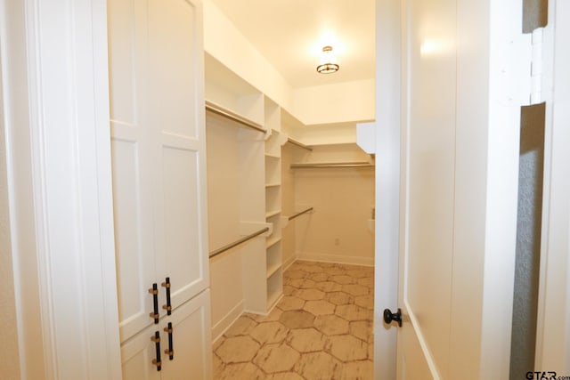 16511 Cooper Way, Tyler, TX 75703 - spacious closet featuring light tile patterned floors
