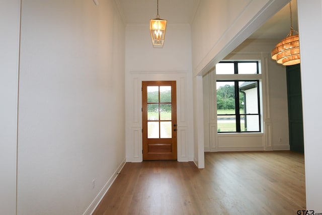 16511 Cooper Way, Tyler, TX 75703 - entrance foyer featuring wood finished floors, ornamental molding, and baseboards
