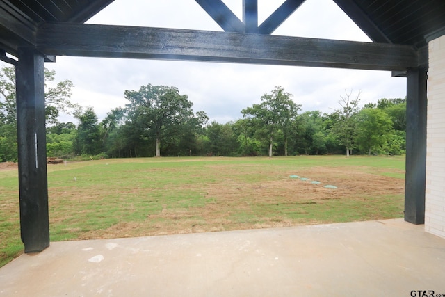 16511 Cooper Way, Tyler, TX 75703 - view of grassy yard with a patio