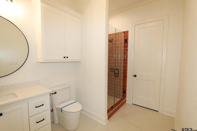 16511 Cooper Way, Tyler, TX 75703 - bathroom with vanity, a stall shower, toilet, baseboards, and tile patterned flooring