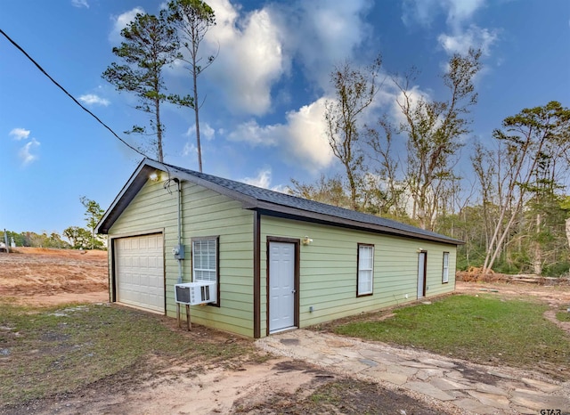 view of outdoor structure with a garage