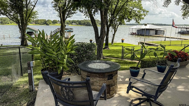 14227 Melody Ln, Malakoff, TX 75148 - view of patio featuring an outdoor fire pit, a water view, and a boat dock