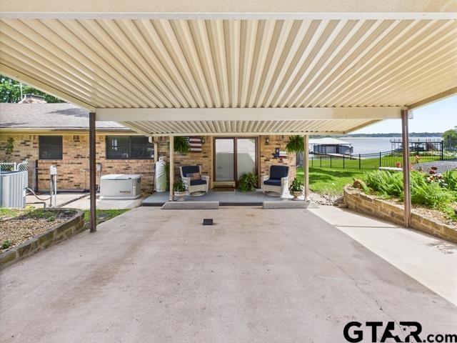 14227 Melody Ln, Malakoff, TX 75148 - view of patio featuring cooling unit