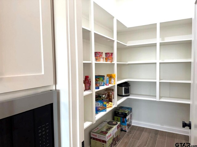 mudroom featuring wood-type flooring