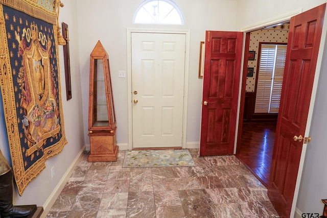 foyer entrance featuring a healthy amount of sunlight