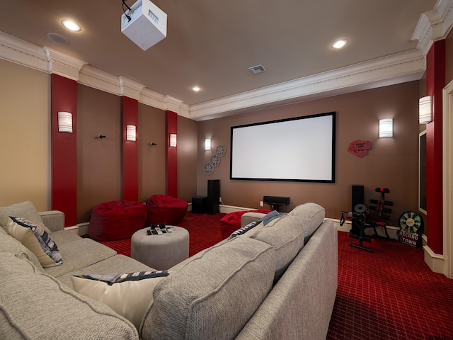 cinema with carpet flooring and ornamental molding