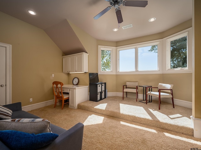 living room with light carpet and ceiling fan