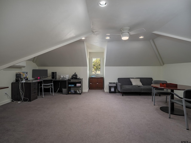 office area featuring ceiling fan, carpet flooring, and vaulted ceiling