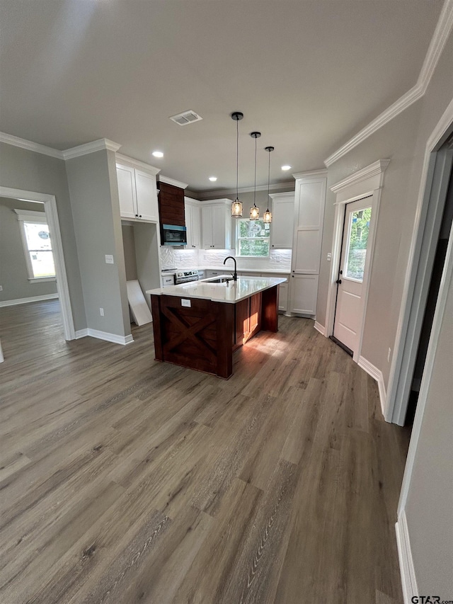 300RODENAVENU 300 Roden Ave, Gladewater, TX 75647 - kitchen with tasteful backsplash, crown molding, light countertops, baseboards, and white cabinetry