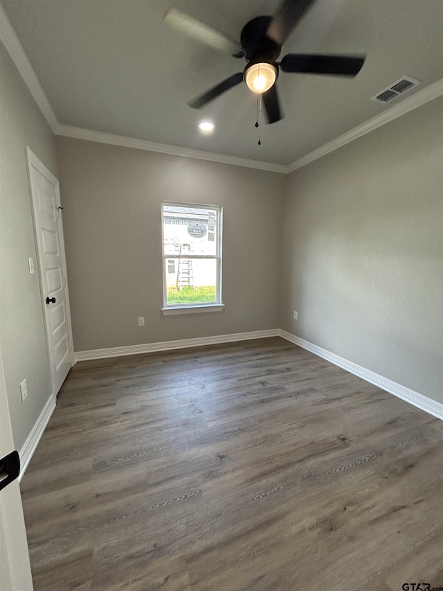300RODENAVENU 300 Roden Ave, Gladewater, TX 75647 - spare room with ornamental molding, ceiling fan, dark wood-style floors, and baseboards