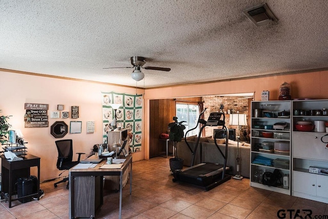 8105 Jewell Ln, Tyler, TX 75703 - office area with visible vents, ornamental molding, a ceiling fan, a textured ceiling, and tile patterned flooring