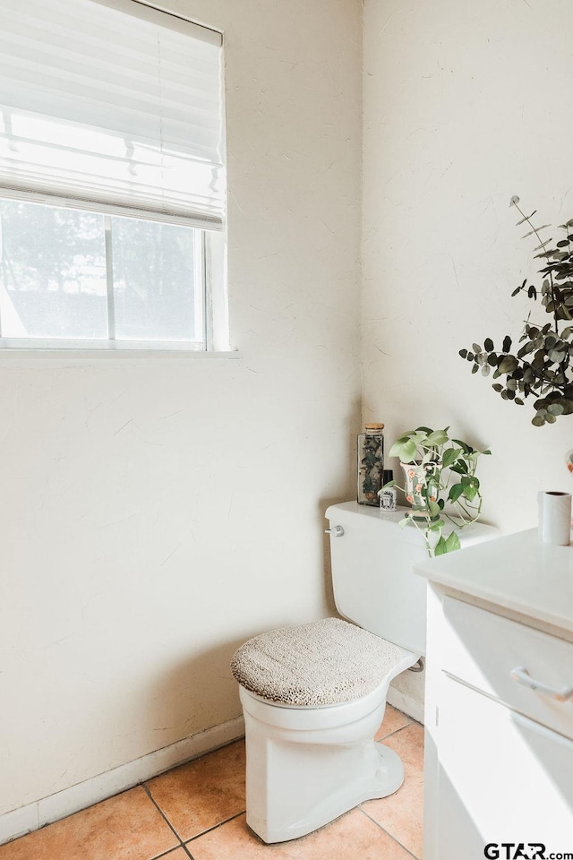 8105 Jewell Ln, Tyler, TX 75703 - half bathroom featuring toilet, tile patterned flooring, and vanity