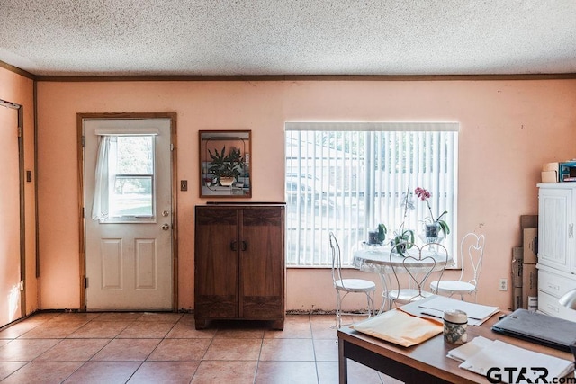8105 Jewell Ln, Tyler, TX 75703 - interior space featuring light tile patterned floors and a textured ceiling