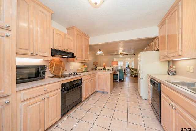 kitchen featuring pendant lighting, light tile patterned floors, ceiling fan, black appliances, and light brown cabinets