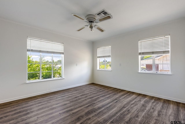 unfurnished room featuring ceiling fan and dark hardwood / wood-style flooring