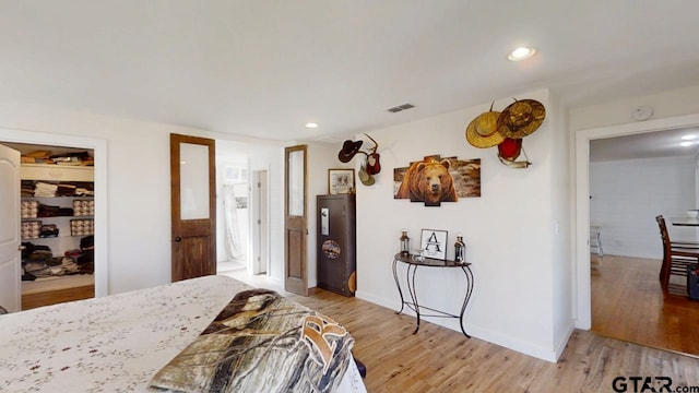 bedroom featuring light hardwood / wood-style floors