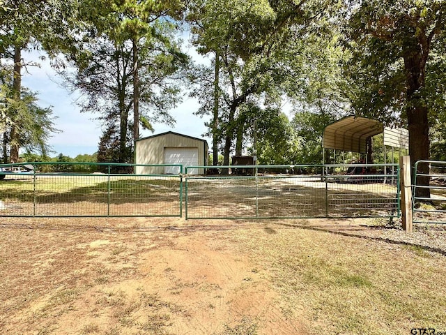 view of community featuring an outbuilding