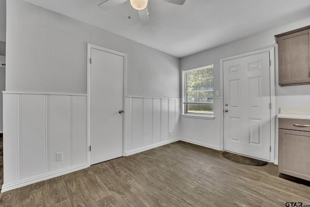 interior space with light hardwood / wood-style flooring and ceiling fan