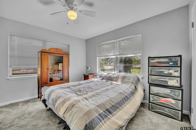 bedroom featuring ceiling fan and carpet floors