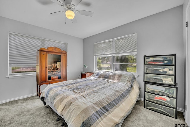 650 Glazner St, Hawkins, TX 75765 - carpeted bedroom with baseboards and ceiling fan