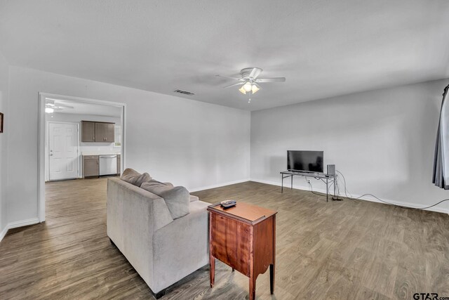 650 Glazner St, Hawkins, TX 75765 - living area featuring a ceiling fan and wood finished floors