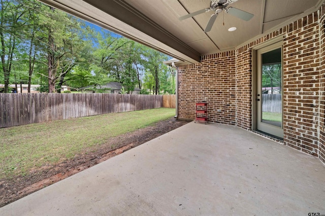 view of patio / terrace featuring ceiling fan