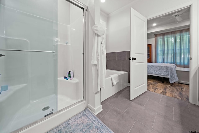 bathroom with ornamental molding, tile patterned flooring, and separate shower and tub