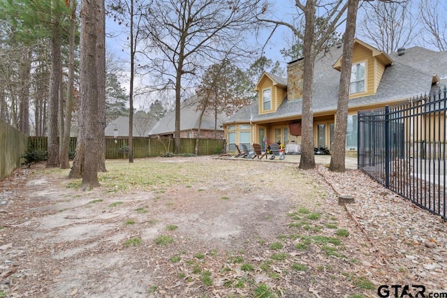 view of yard featuring a fenced backyard