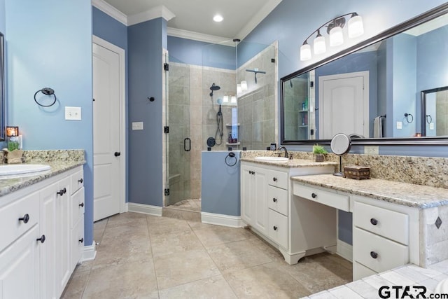 bathroom with ornamental molding, vanity, a shower stall, and tile patterned floors