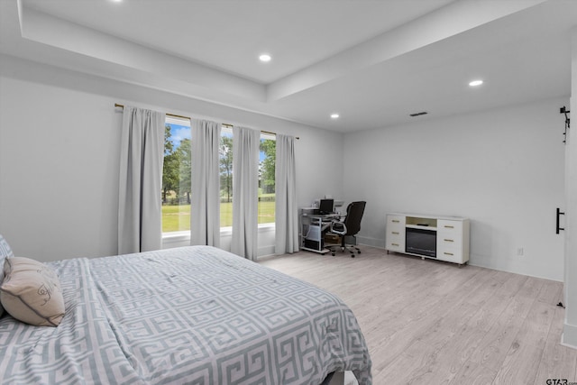 2680 Primera Rd, Tyler, TX 75705 - bedroom featuring light wood-type flooring, recessed lighting, and a desk